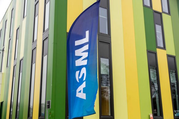 A banner flag with the ASML logo outside the Brainport Industries Campus, which houses the ASML Academy, in Eindhoven, Netherlands.